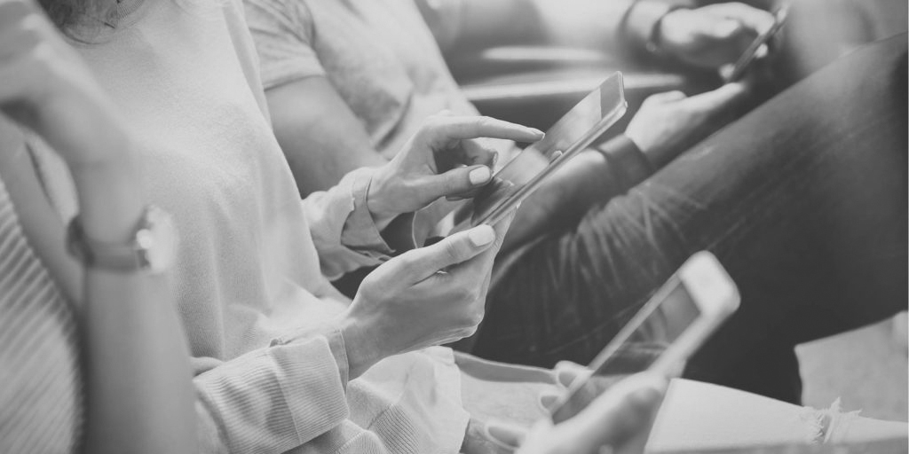 Going native with a group of people viewing phones and tablets