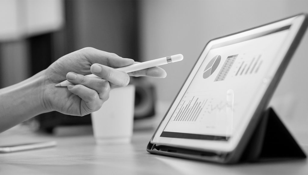 Accountant reviewing financial information on an ipad