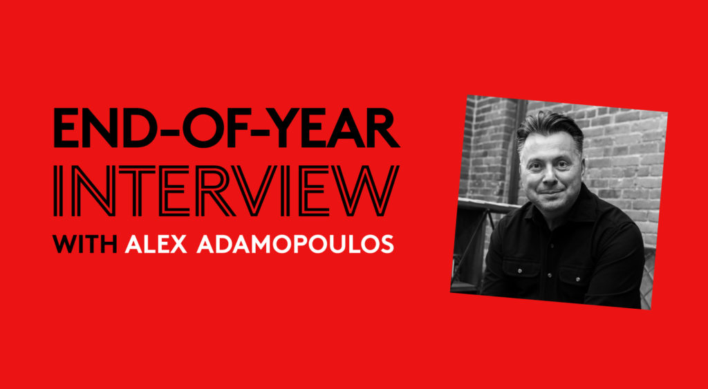 End of year interview text graphic with a photo of Emergn CEO, Alex Adamopoulos